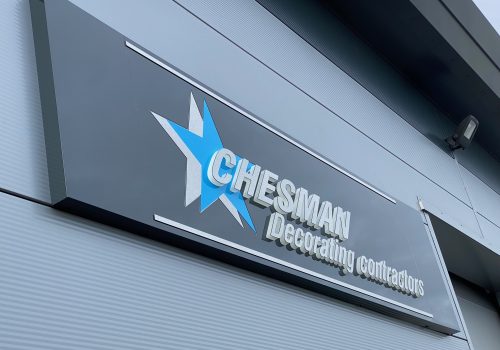 Chesman illuminated fabricated sign